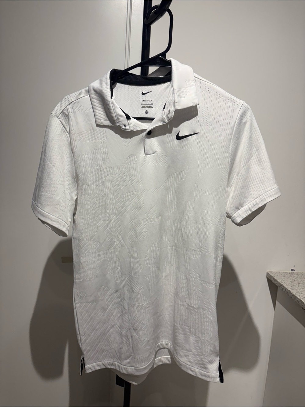 Nike White Men’s Dri-FIT Polo with Black Swoosh